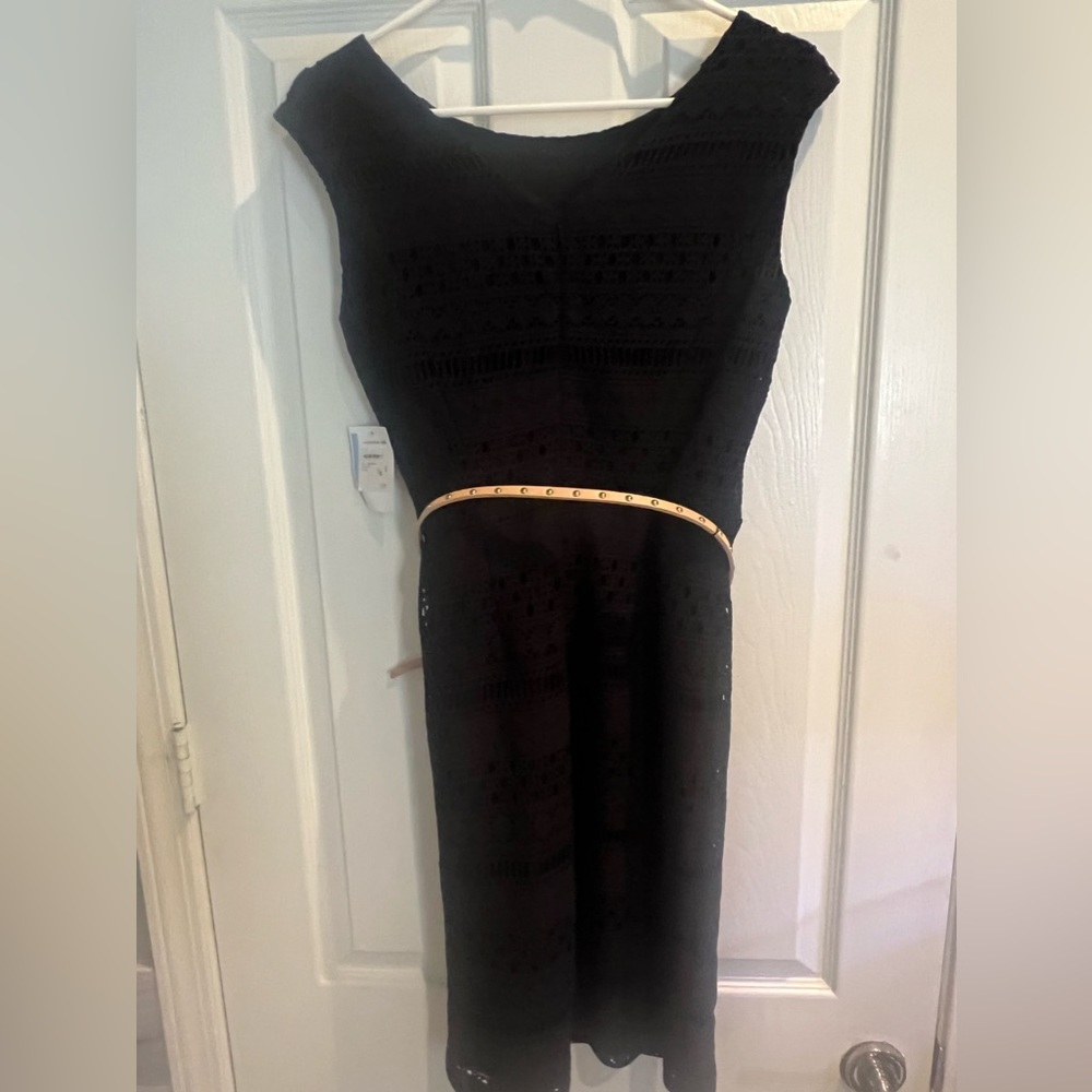 Ellen Tracy fully lined detailed open knit black dress with leather belt.Size 6